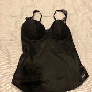 A very nice small corset lace and satin black.